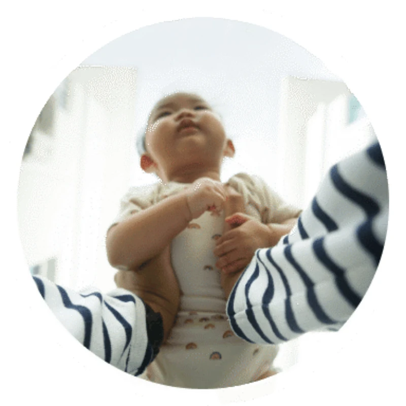 holding an infant